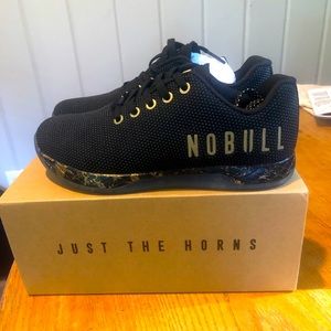 Nobull shoes black and gold pride edition